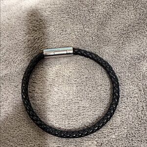 Authentic, men’s Hermes Bracelet 
Black Braided lBracelet with Silver Clasp